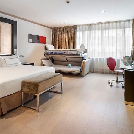 Melia Madrid Princesa Esterno foto A room at the hotel