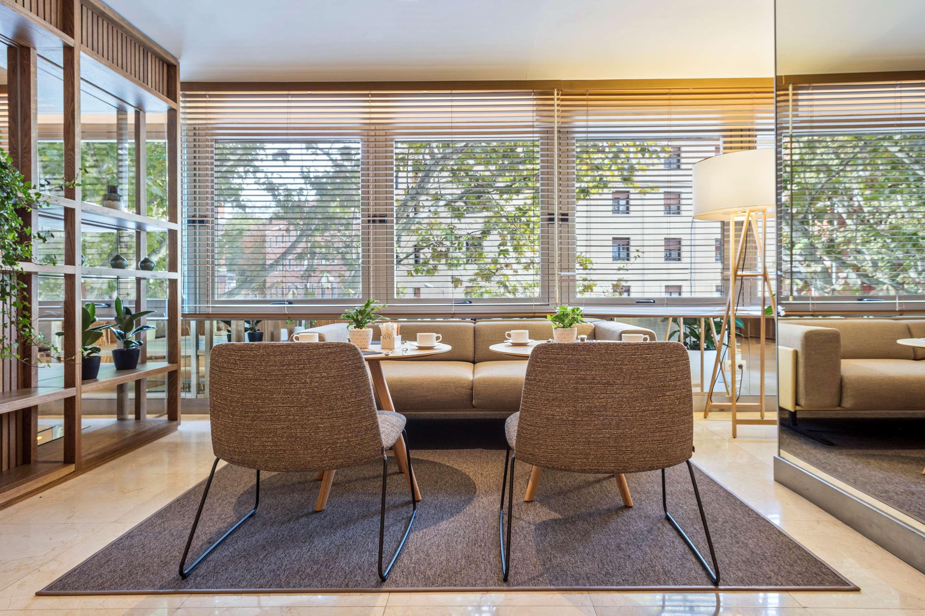 Melia Madrid Princesa Esterno foto The interior of the hotel