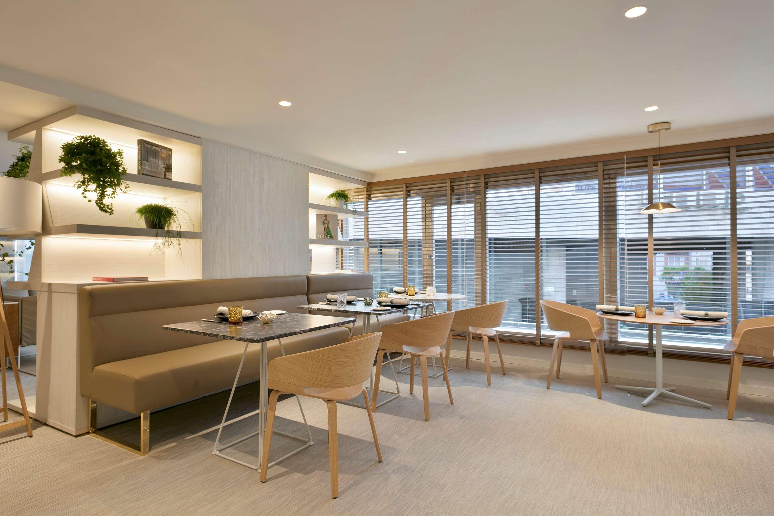 Melia Madrid Princesa Esterno foto The interior of the lounge