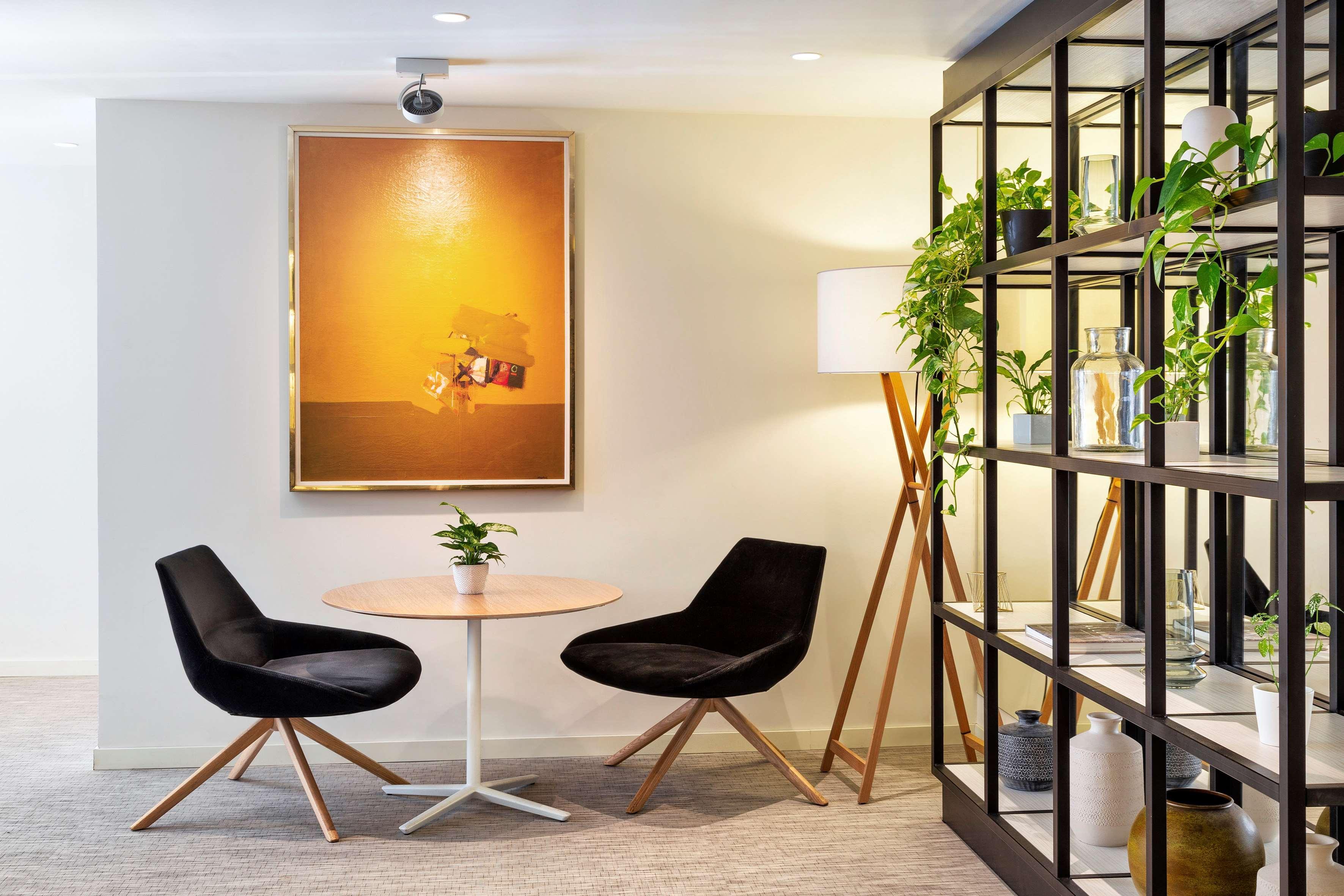 Melia Madrid Princesa Esterno foto Interior of a suite at the hotel