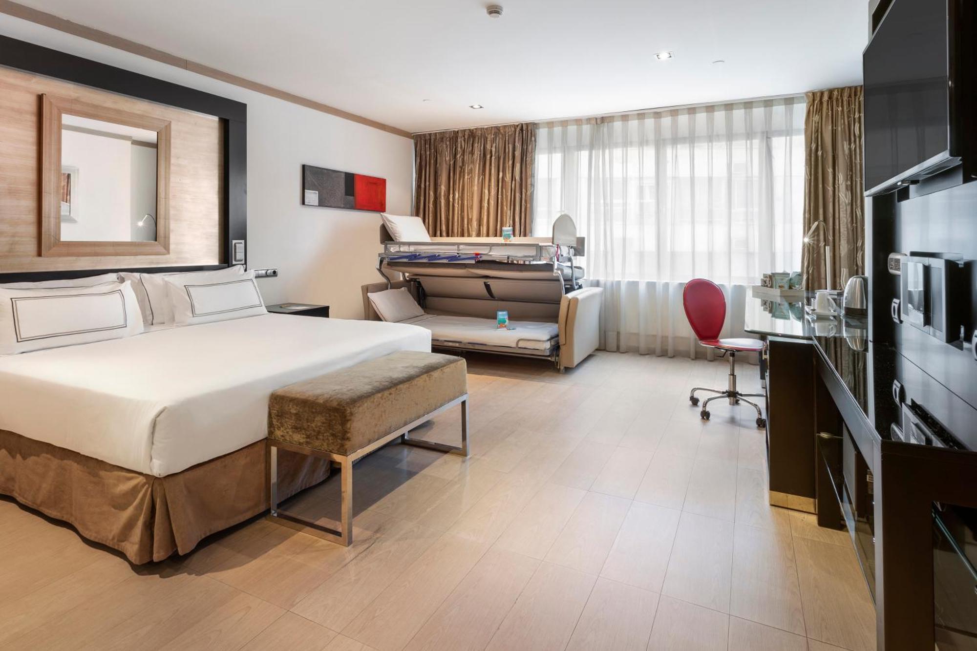 Melia Madrid Princesa Esterno foto A room at the hotel